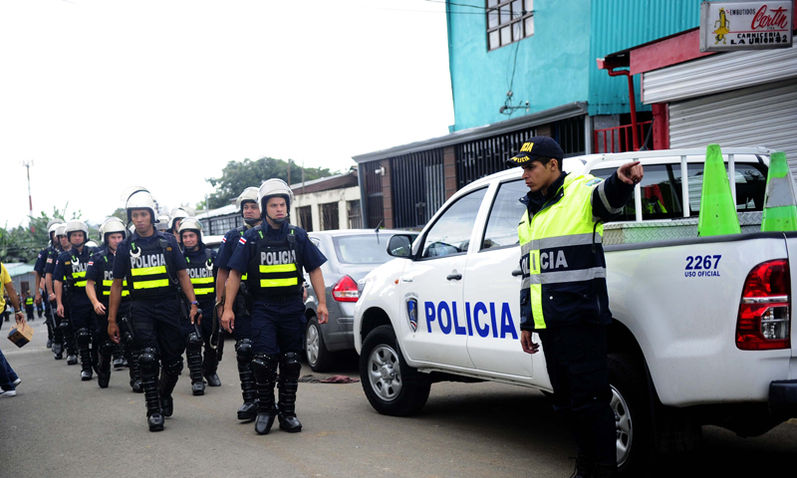 Police (Fuerza Publica) in action in the violent Desamparados, the dense poluplate community in Costa Rica, south of San José