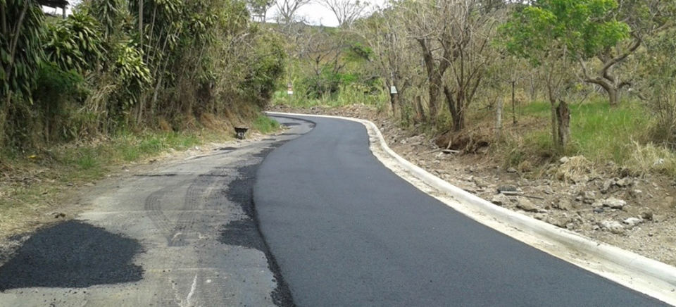 Only One Half Of Heredia Rural Road Paved, The Other Half Belongs To Alajuela