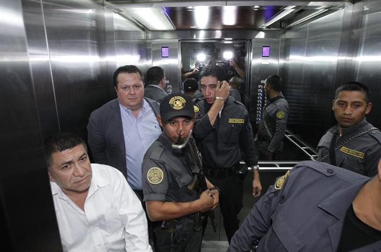 Jiménez González, alias Palidejo, escorted from the courtroom after sentencing