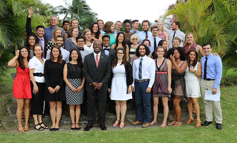 U.S. Ambassador to Costa Rica, , stands with the last group of Peace Corps volunteers