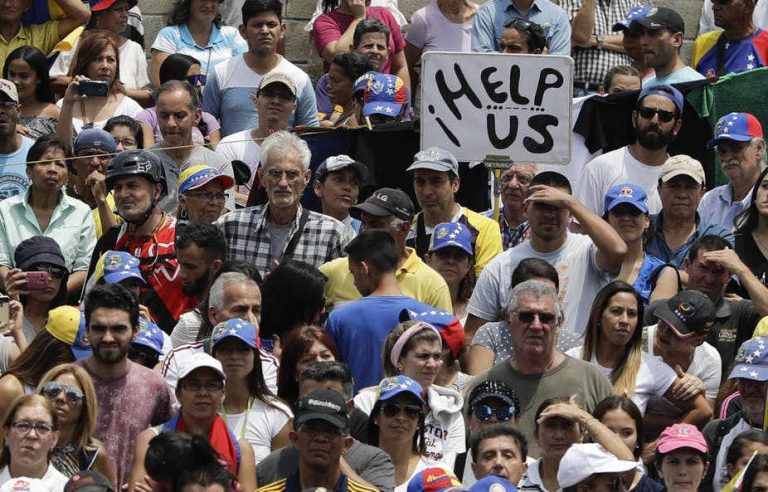 Venezuela’s power struggle reaches a tense stalemate, as human suffering deepens